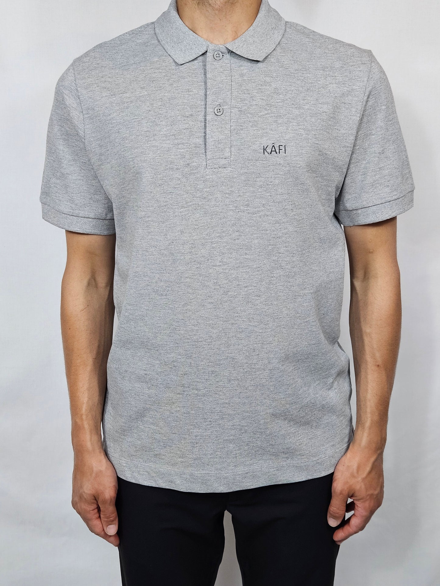 Polo unisexe uni logo relief