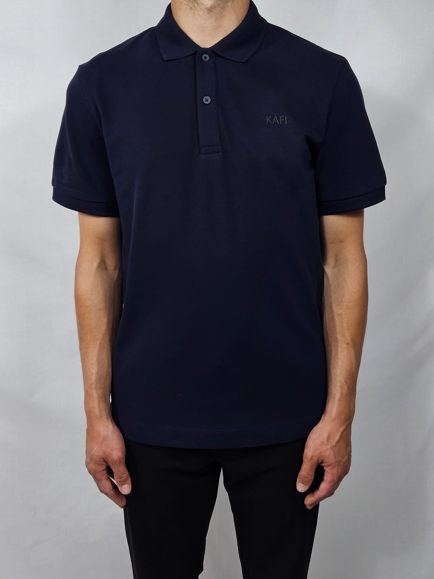 Polo unisexe uni logo relief